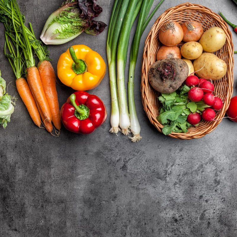 Vegetables spread out on a stone table