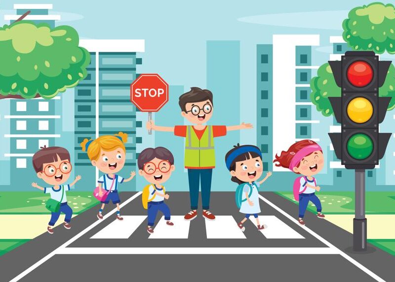 Crossing guard helping children cross the street
