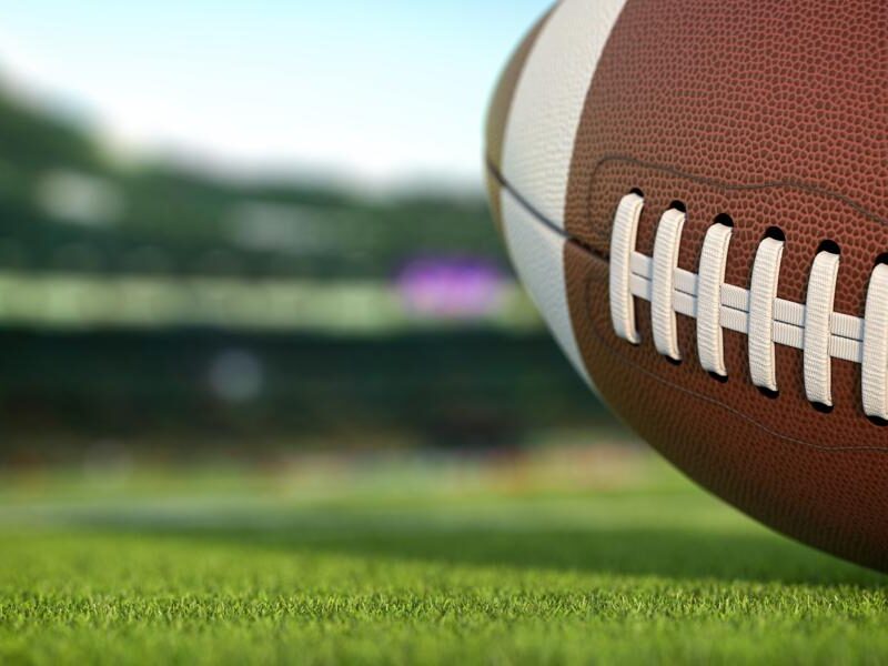 football laying on grass